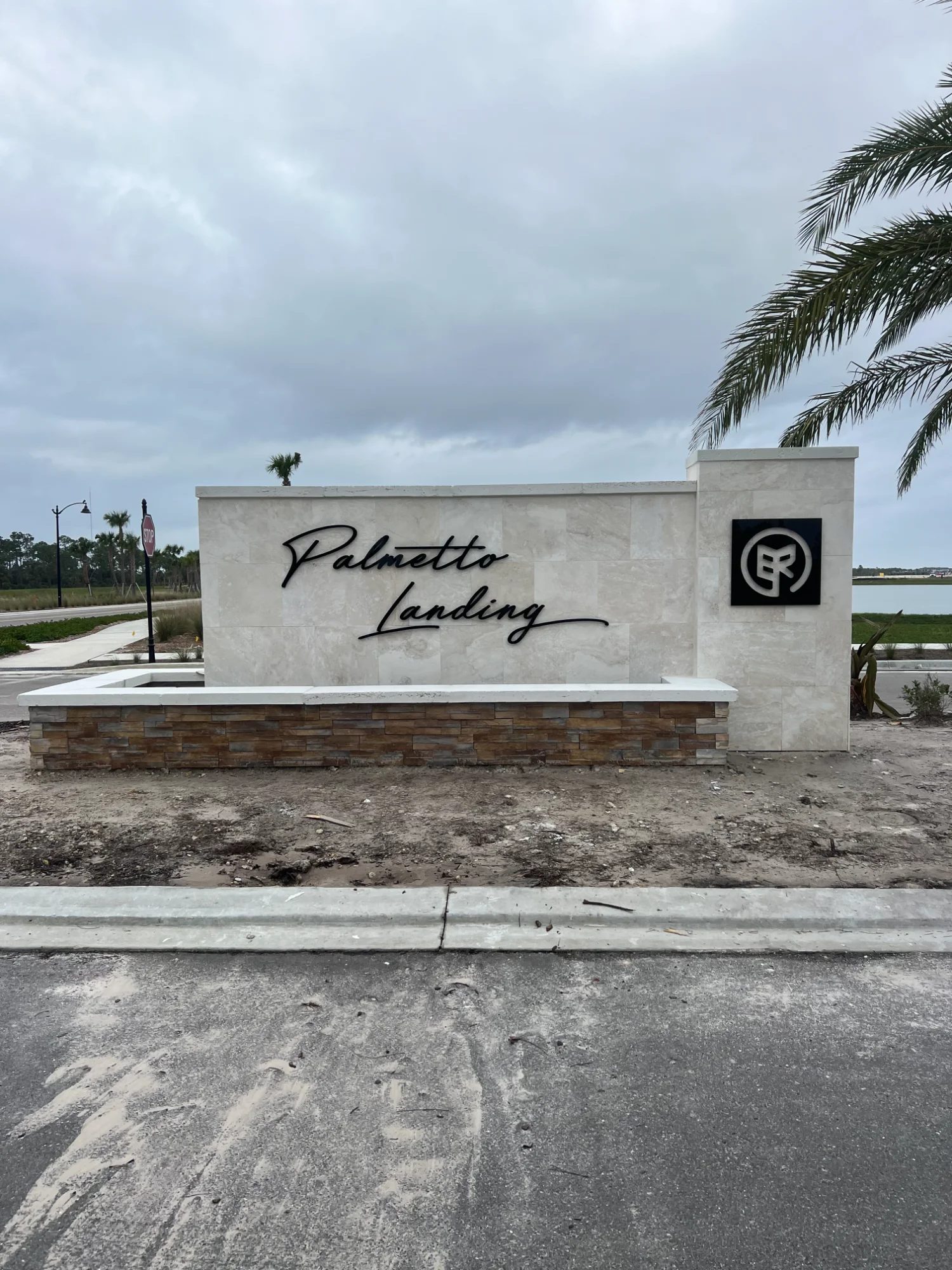 Luxury precast concrete monument sign at waterfront community in Florida