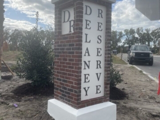 brick-pillar-monument-sign-delaney-reserve-florida Vertical brick pillar monument sign with dimensional letters Delaney Reserve Florida