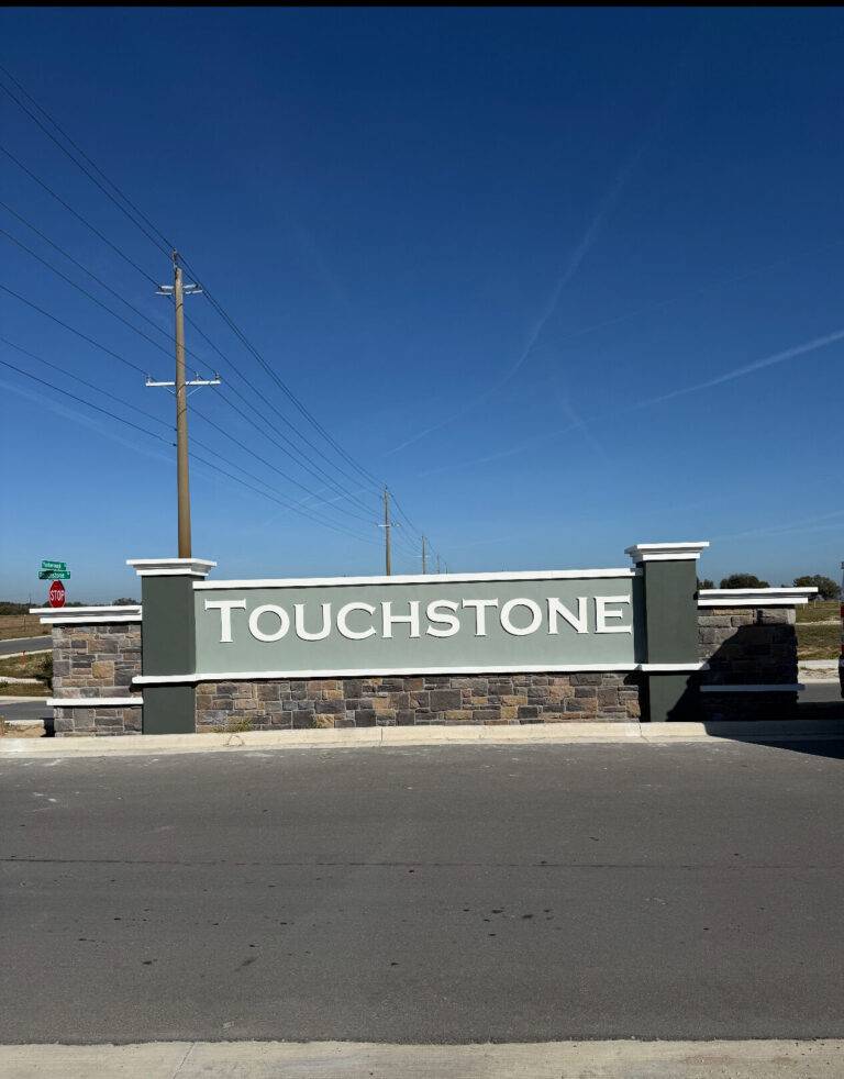 Contemporary sage precast concrete monument sign for Touchstone community Florida