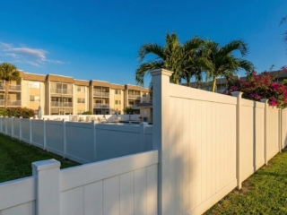 tan-vinyl-privacy-fence-residential-pool-florida tan vinyl privacy fence residential pool Florida