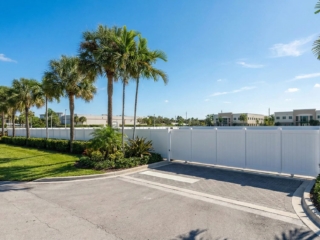 white-vinyl-fence-gate-commercial-entrance-florida white Vinyl Fence commercial entrance Florida