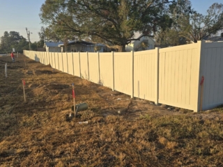 tan-vinyl-privacy-fence-installation-florida tan vinyl privacy fence installation Florida
