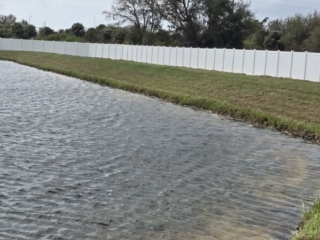 white-vinyl-privacy-fence-retention-pond-florida white vinyl privacy fence retention pond Florida